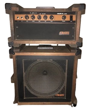 Vintage crate amps lined up showing the brand's wooden crate-inspired cabinet design