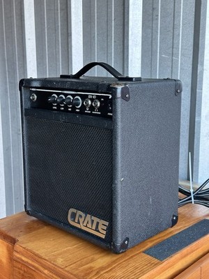 Crate amplifier guitar combo amp on a dark stage with warm stage lighting